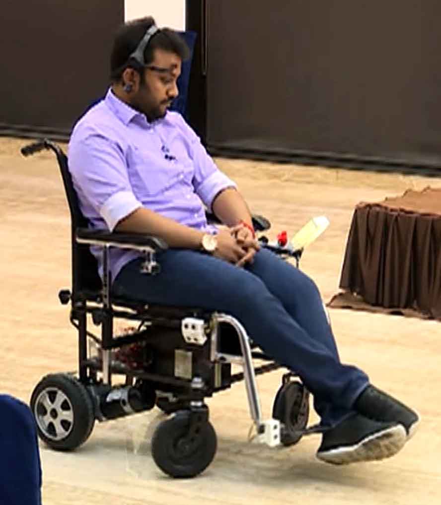 Diwakar Vaish demonstrating how the mind-controlled wheelchair works