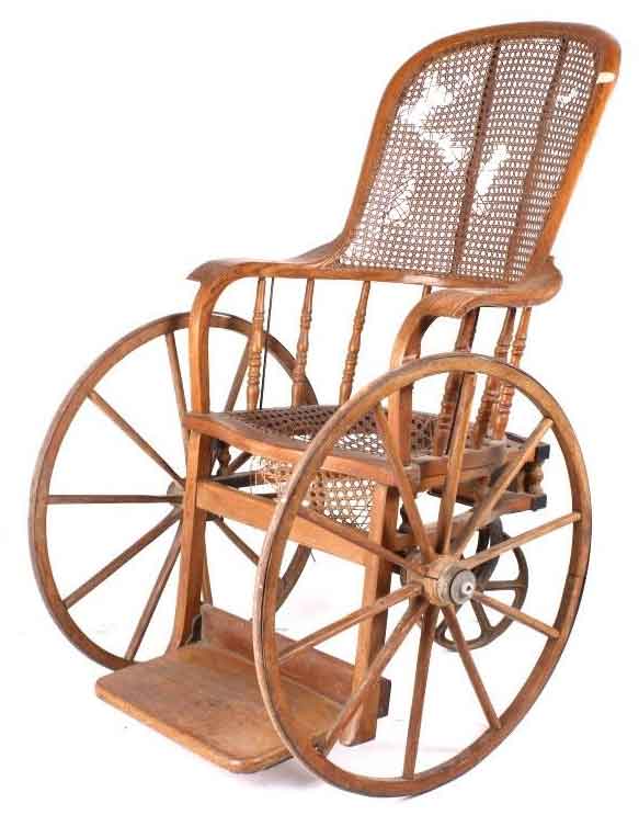 wooden spiked wheelchair