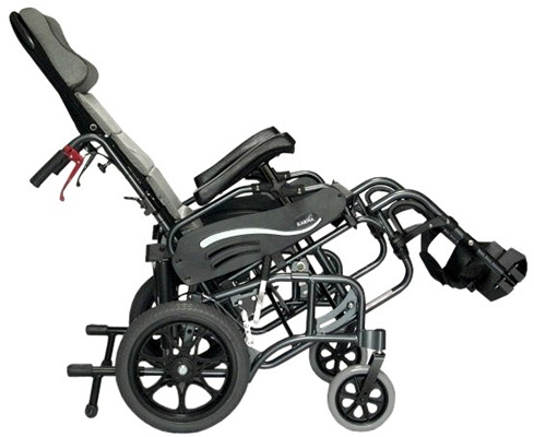 The VIP 515 Reclining wheelchair facing to the right side with its seat in a recline position
