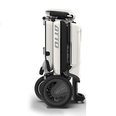 Folded Atto electric scooter in a standing position