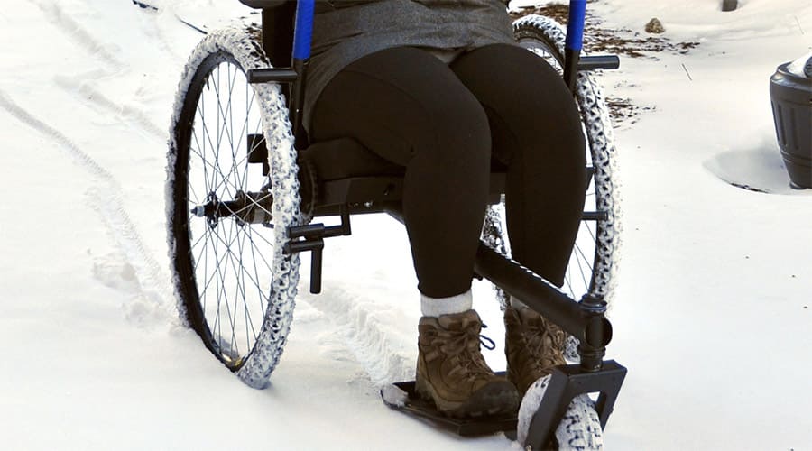 A person using the Grit Freedom Chair in snow 