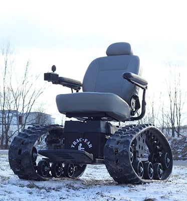 All terrain electric wheelchair on a snow