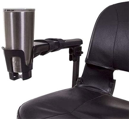 A cup in a wheelchair's cup holder 