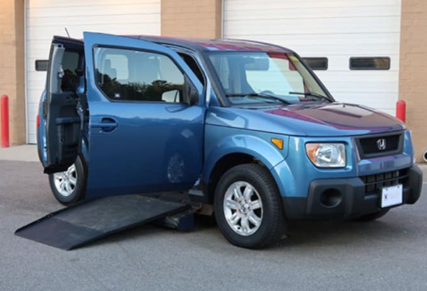 Blue Honda XWAV with half-open side doors and ramp