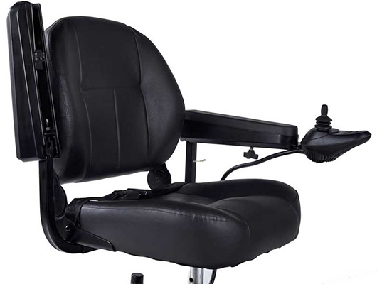 Seat of the Zipr PC Power Electric Wheelchair with the right armrest flipped-up